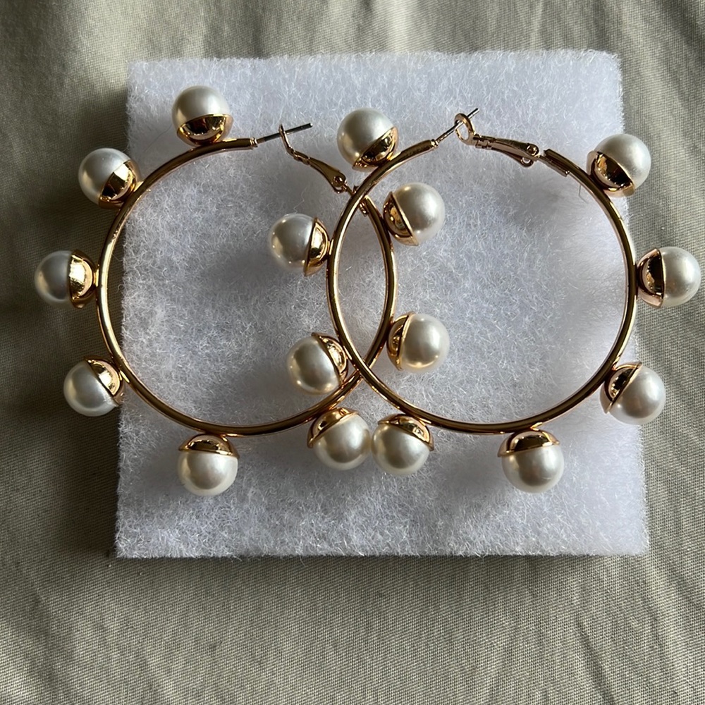 Never worn; pearl hoops